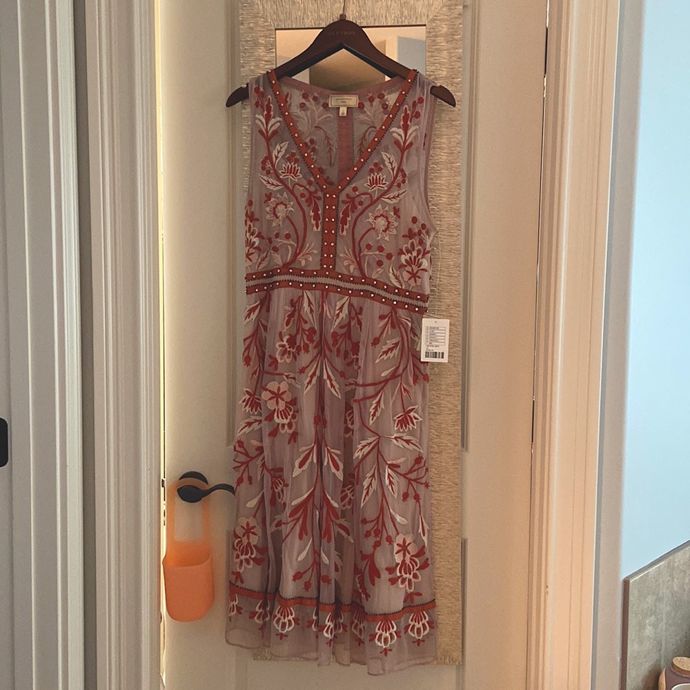 Stunning and unique Anthropologie dress.